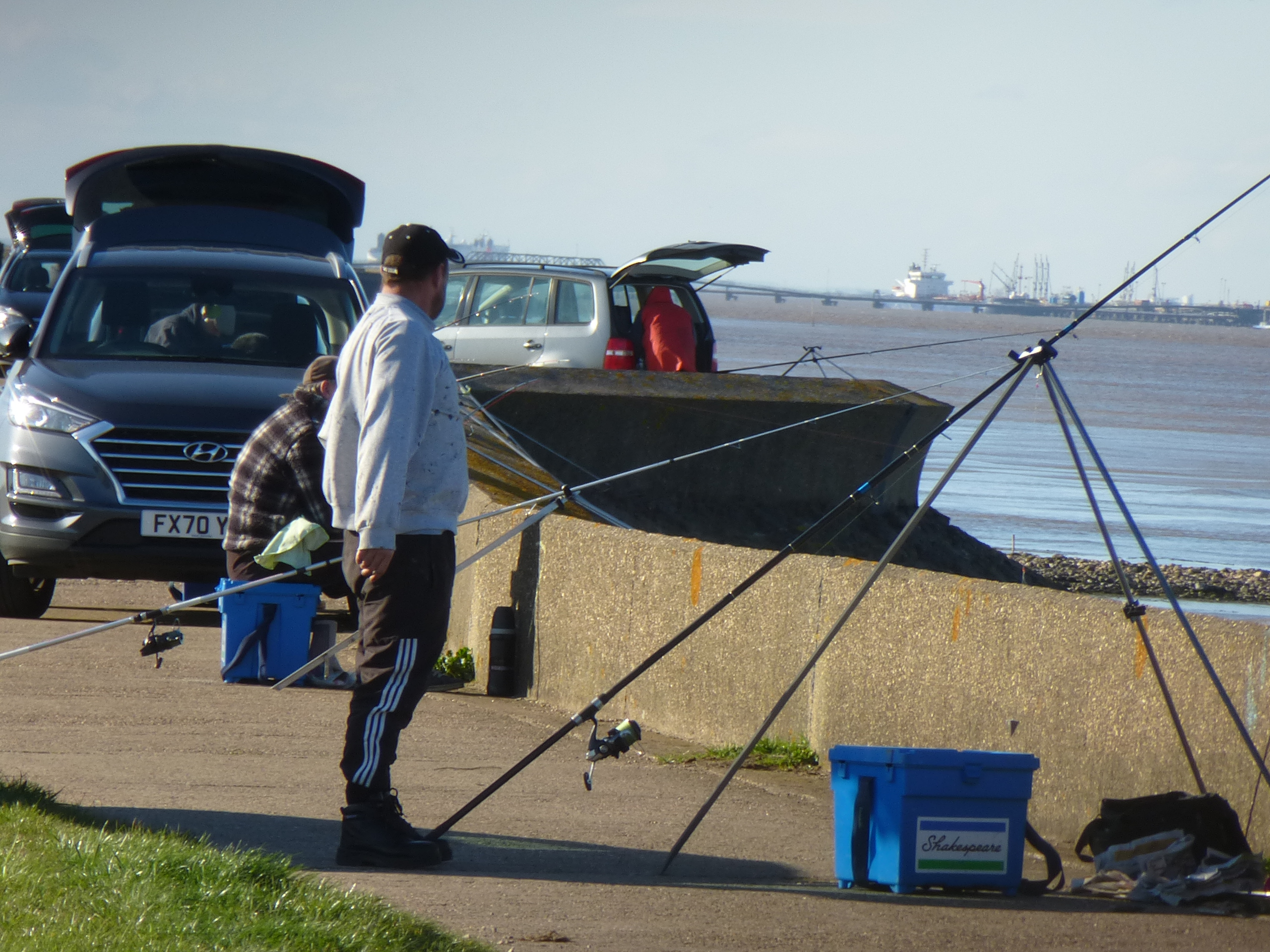 Three anglers fishing at the Shallows, Grimsby