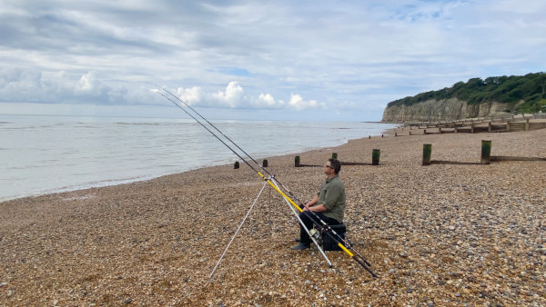 Man sea fishing at pett