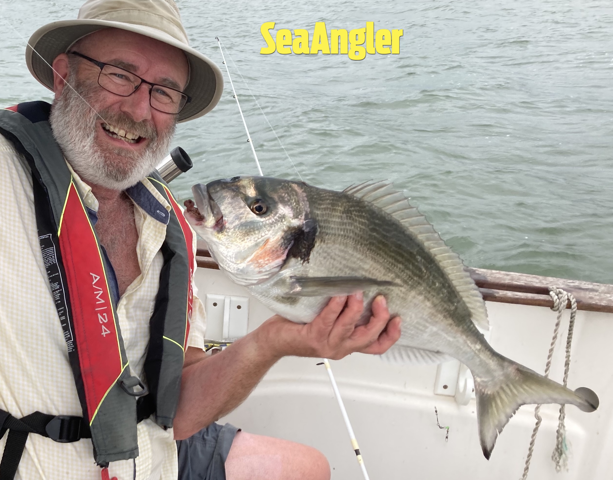 Man holding record breaking fish