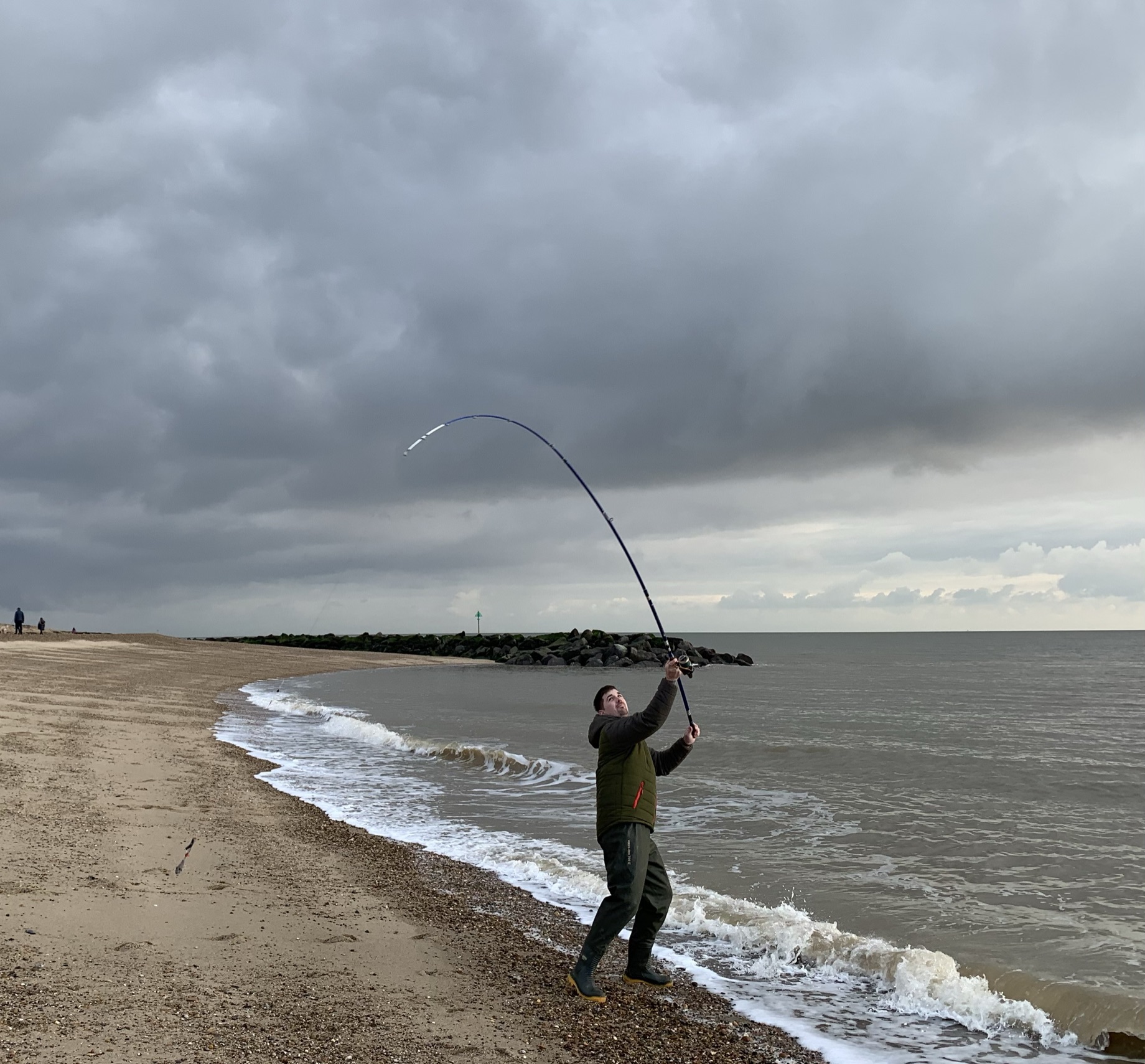 Man casting at Holland beach