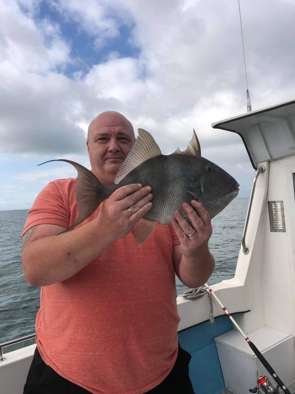 Man holding fish