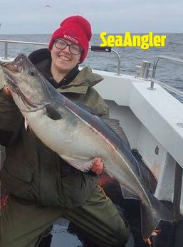 Woman holding fish