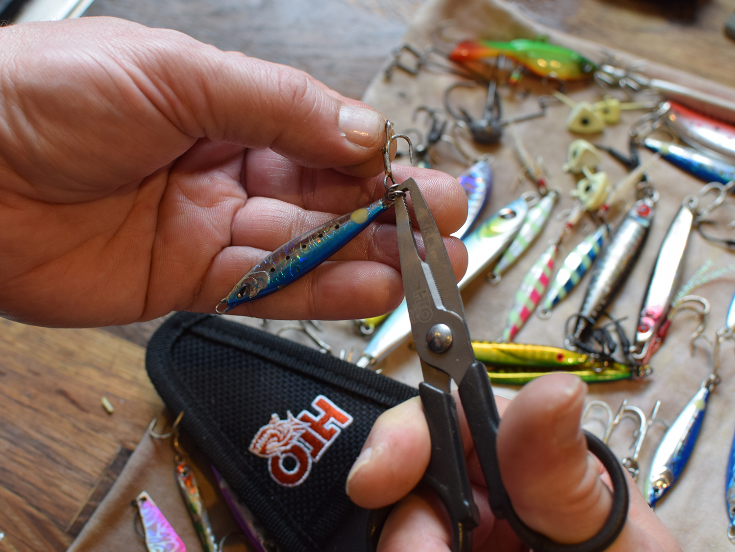 Changing hooks with split ring pliers