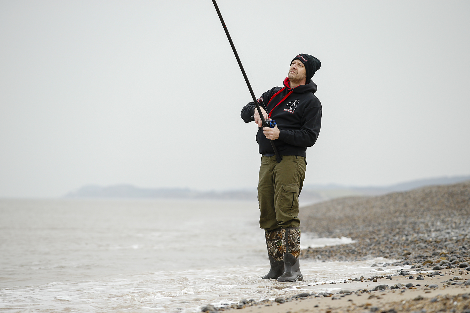 Man fishing on beach